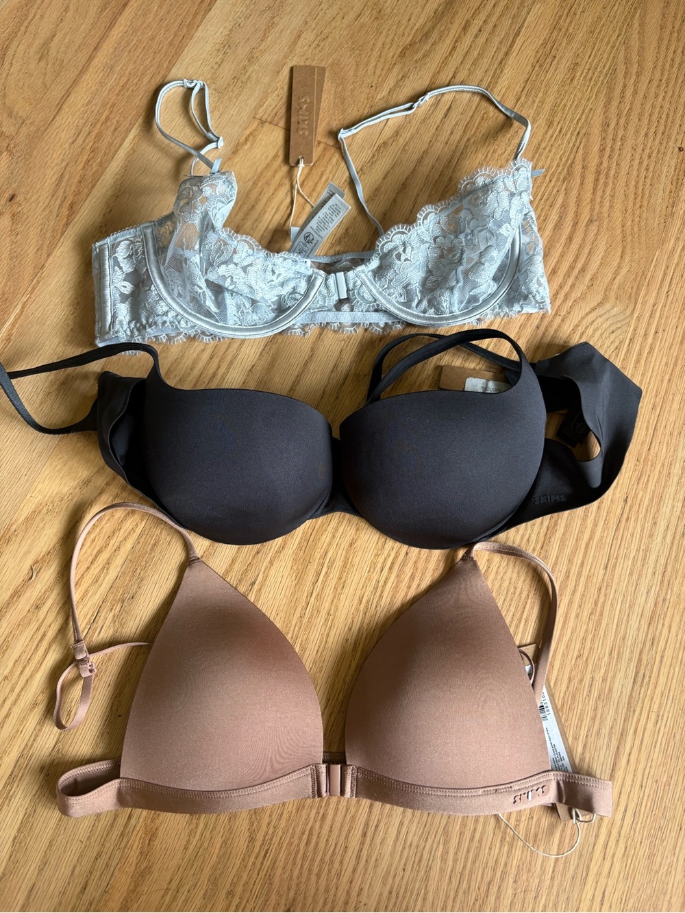 SKIMS Trio Bra Set in Light Blue Lace, Black and Nude